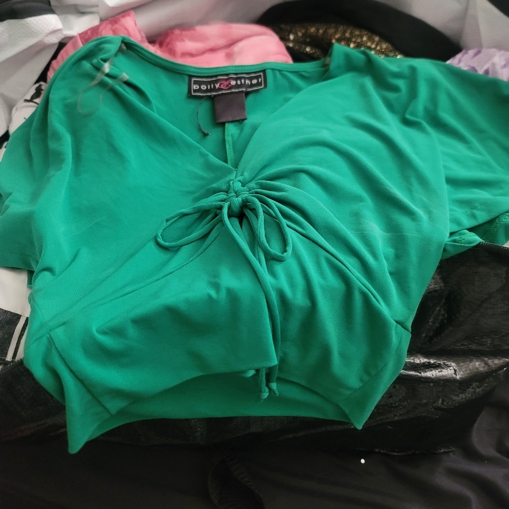 Polly Esther Green slightly  adjustable mid section in size Large